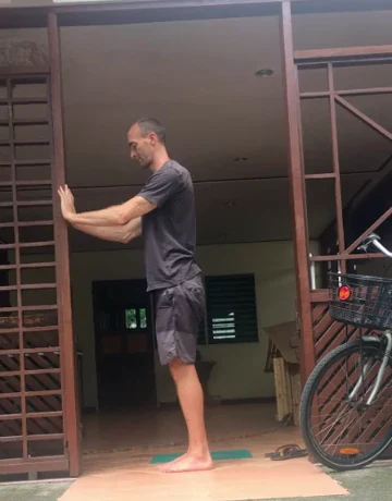Jason demonstrating a supported standing push-up