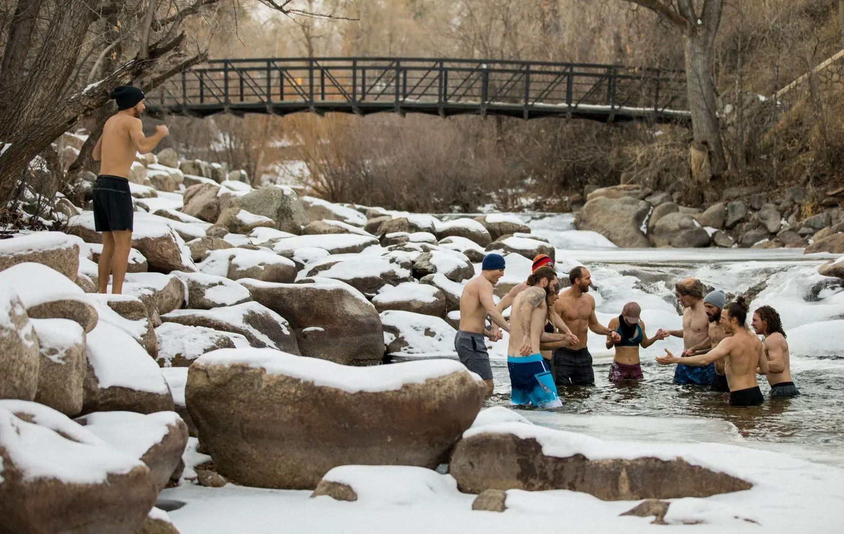 Jason Ryer practicing cold exposure in a mountain cold plunge