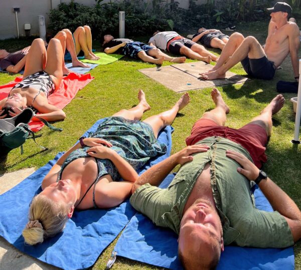 Zen Strength group resting after guided breathwork in Chiang Mai
